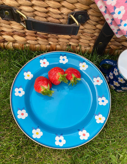 Beautiful enamel plates in teal ocean blue. Pretty, durable AND practical, they have a pretty flower design and steel rim around the edge. Camping in style! Photo shows pretty picnic set up including rose pink tea towel and our midnight enamel mug.